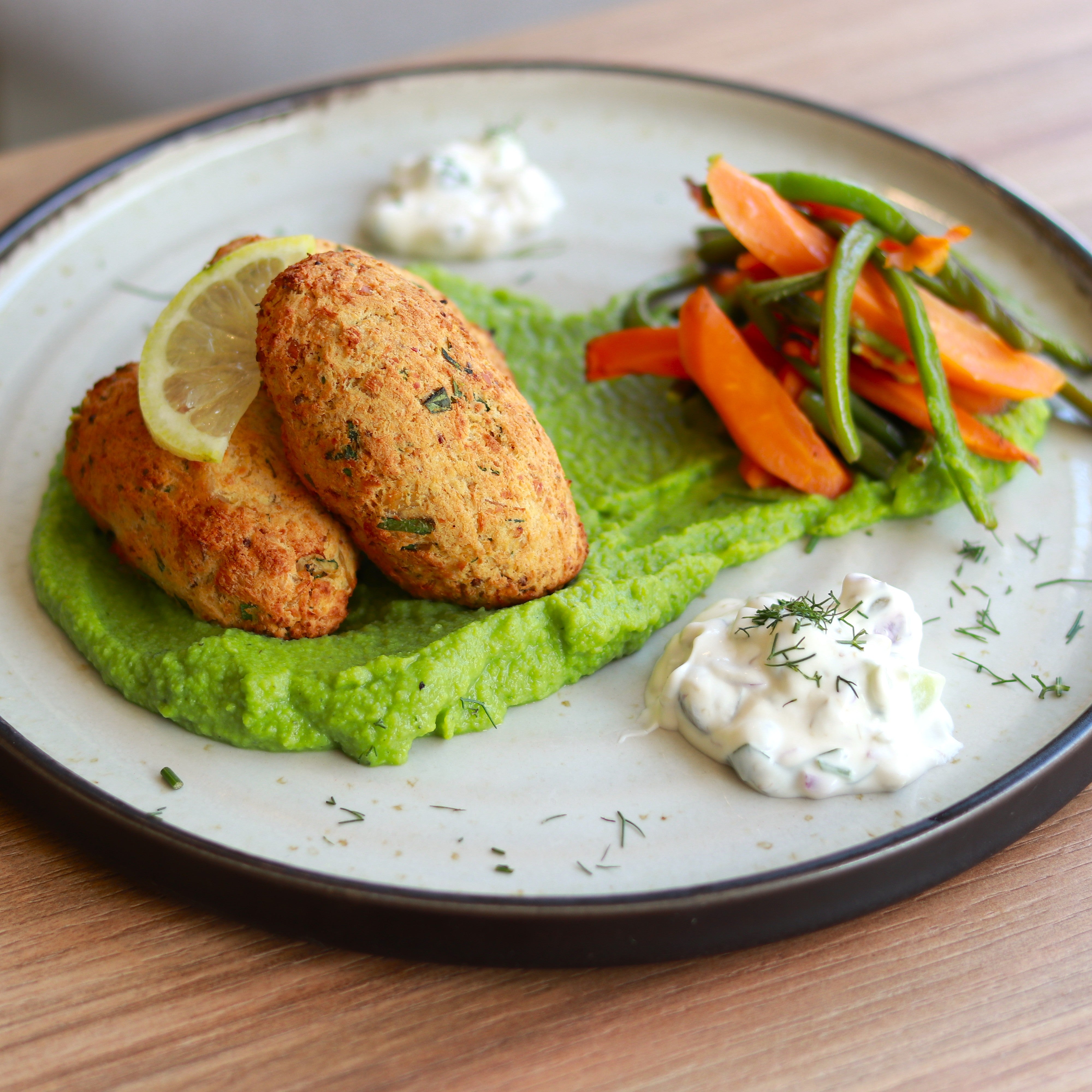 Codfish and chickpea cakes baked with lemon and caper tartare sauce